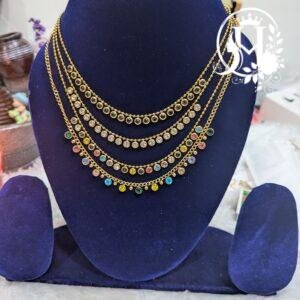 Multi-layered gemstone station necklace