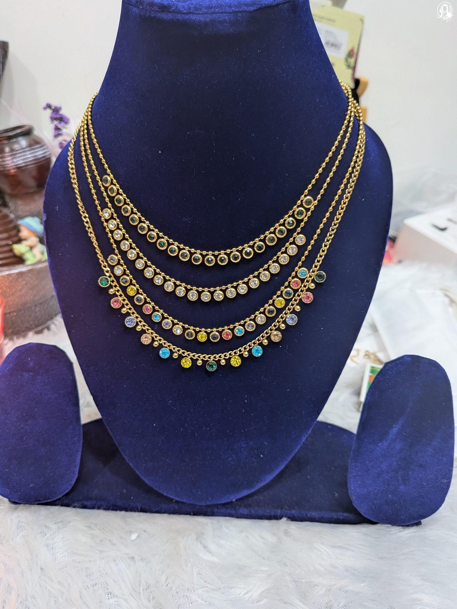 Multi-layered gemstone station necklace
